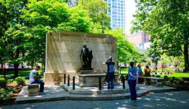 Visitors pay tribute at the Tomb of the Unknown Soldier memorial in Washington Square.