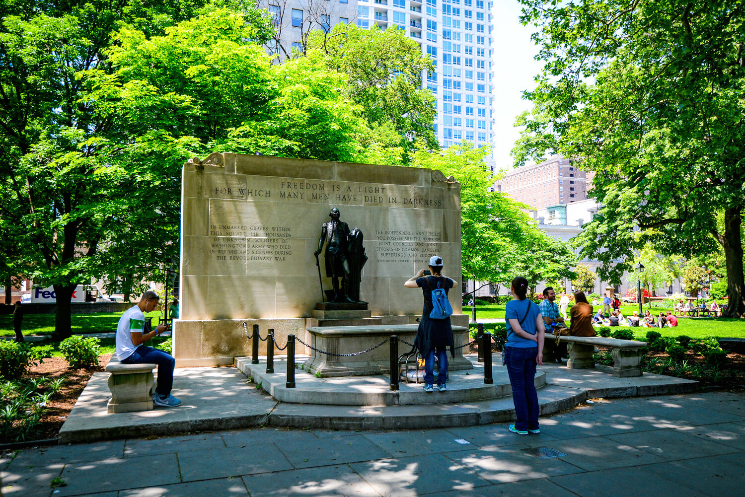 Visitors pay tribute at the Tomb of the Unknown Soldier memorial in Washington Square.