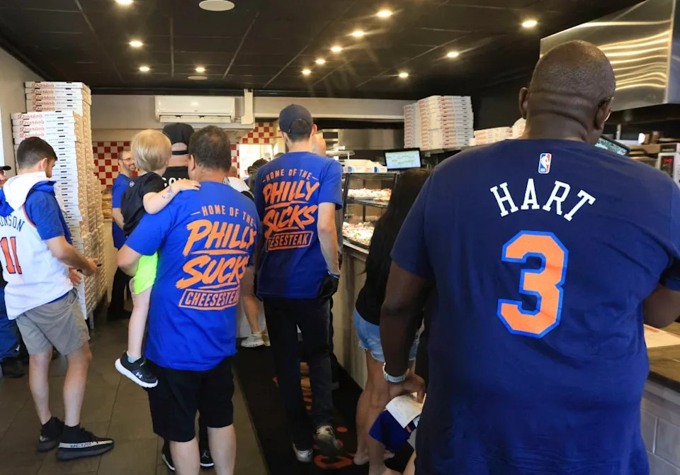 A crowd of hungry Knicks fans wait for the orders on Wednesday. James Messerschmidt for the NY Post