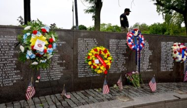 Jay Adams looks over the wall of names following the Memorial Day service at the Philadelphia Vietnam Veterans Memorial. He wears an MIA T-shirt honoring his wife’s uncle, Carlos Ashlock, who was one of nine men from Philadelphia who went Missing in Action during the Vietnam War. Ashlock was 21 when he went missing in 1967 after a days long combat.