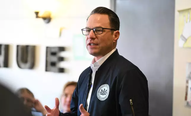 FILE - Pennsylvania Gov. Josh Shapiro speaks to the crowd at a Clinton County Democratic Party event at the Avenue 209 coffee shop, April 11, 2026, in Lock Haven, Pa. (AP Photo/Marc Levy, File)