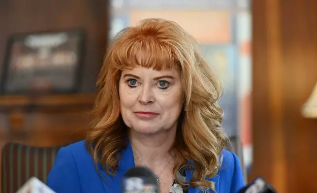 FILE - Pennsylvania state Treasurer Stacy Garrity listens to a question during a news conference in Treasury Department offices, April 23, 2026, in Harrisburg, Pa. (AP Photo/Marc Levy, File)