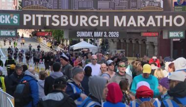 52,000 cross finish line over weekend races
