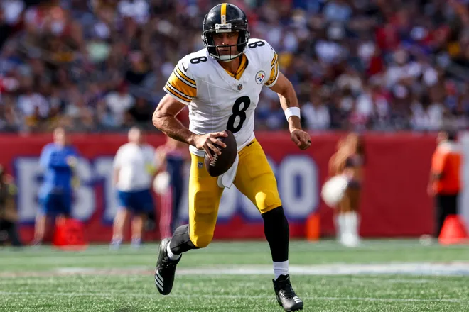 Sep 21, 2025; Foxborough, Massachusetts, USA; Pittsburgh Steelers quarterback Aaron Rodgers (8) runs the ball during the fourth quarter at Gillette Stadium. Mandatory Credit: Paul Rutherford-Imagn Images