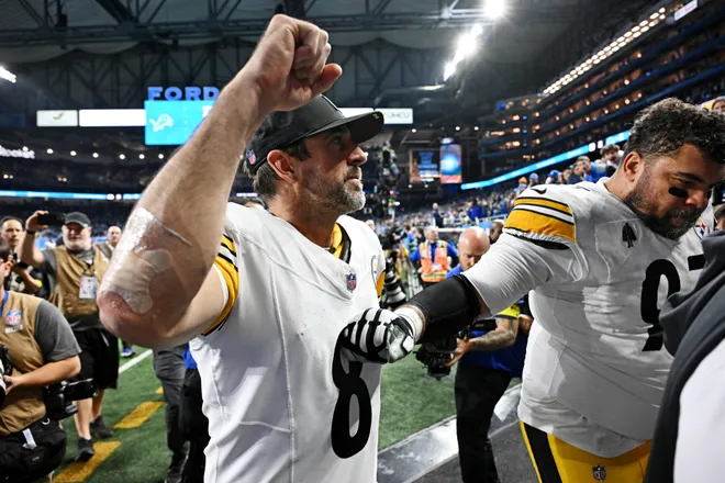 Dec 21, 2025; Detroit, Michigan, USA; Pittsburgh Steelers quarterback Aaron Rodgers (8) celebrates after their win against the Detroit Lions at Ford Field. Mandatory Credit: Lon Horwedel-Imagn Images