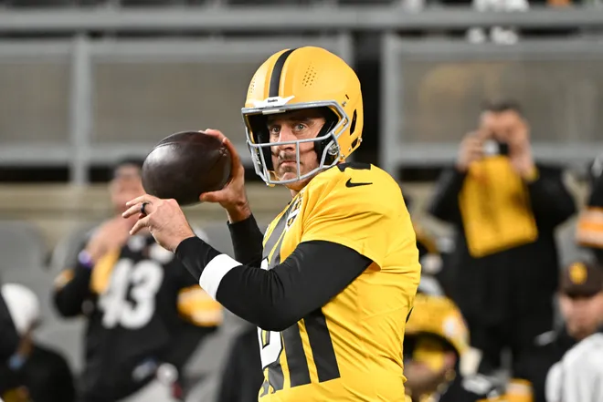 Oct 26, 2025; Pittsburgh, Pennsylvania, USA; Pittsburgh Steelers quarterback Aaron Rodgers (8) warms up prior to the game against the Green Bay Packers at Acrisure Stadium. Mandatory Credit: Barry Reeger-Imagn Images