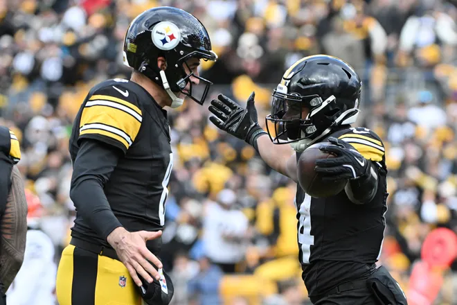 Nov 16, 2025; Pittsburgh, Pennsylvania, USA; Pittsburgh Steelers running back Kenneth Gainwell (14) celebrates with quarterback Aaron Rodgers (8) after scoring a touchdown against the Cincinnati Bengals during the first half at Acrisure Stadium. Mandatory Credit: Barry Reeger-Imagn Images