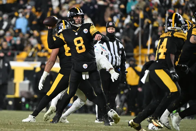Dec 15, 2025; Pittsburgh, Pennsylvania, USA; Pittsburgh Steelers quarterback Aaron Rodgers (8) throws a touchdown pass in the third quarter against the Miami Dolphins at Acrisure Stadium. Mandatory Credit: Barry Reeger-Imagn Images