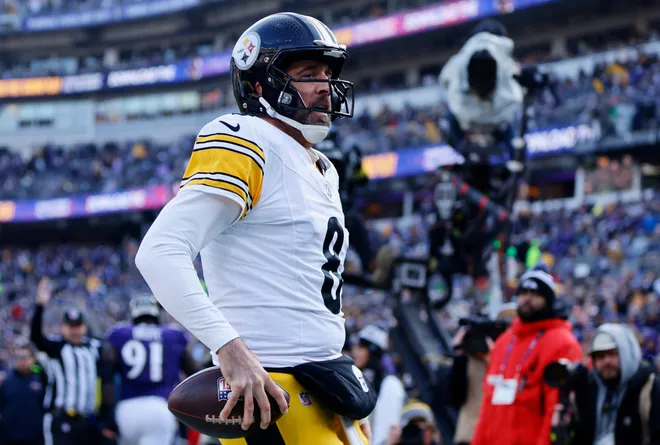 Dec 7, 2025; Baltimore, Maryland, USA; Pittsburgh Steelers quarterback Aaron Rodgers (8) reacts after scoring a touchdown against the Baltimore Ravens during the first half at M&T Bank Stadium. Mandatory Credit: Peter Casey-Imagn Images