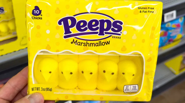 A person holds a package of Peeps