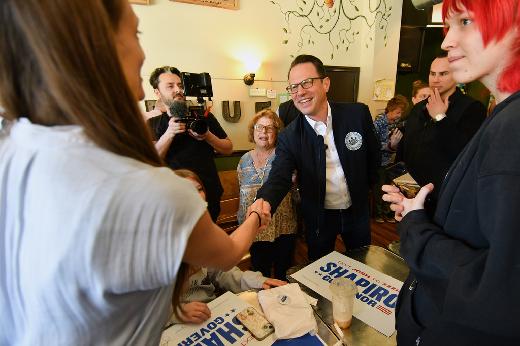 Gov. Josh Shapiro (D-PA) greets members of the crowd after speaking at a Clinton County Democratic Party event at the Avenue 209 coffee shop, April 11, 2026, in Lock Haven, Pa. (AP Photo/Marc Levy)