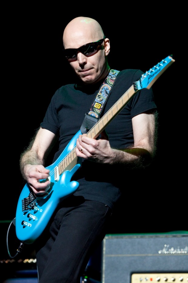 Joe Satriani will be joined by fellow guitar legend Steve Vai for a show in Reading. (Associated Press)