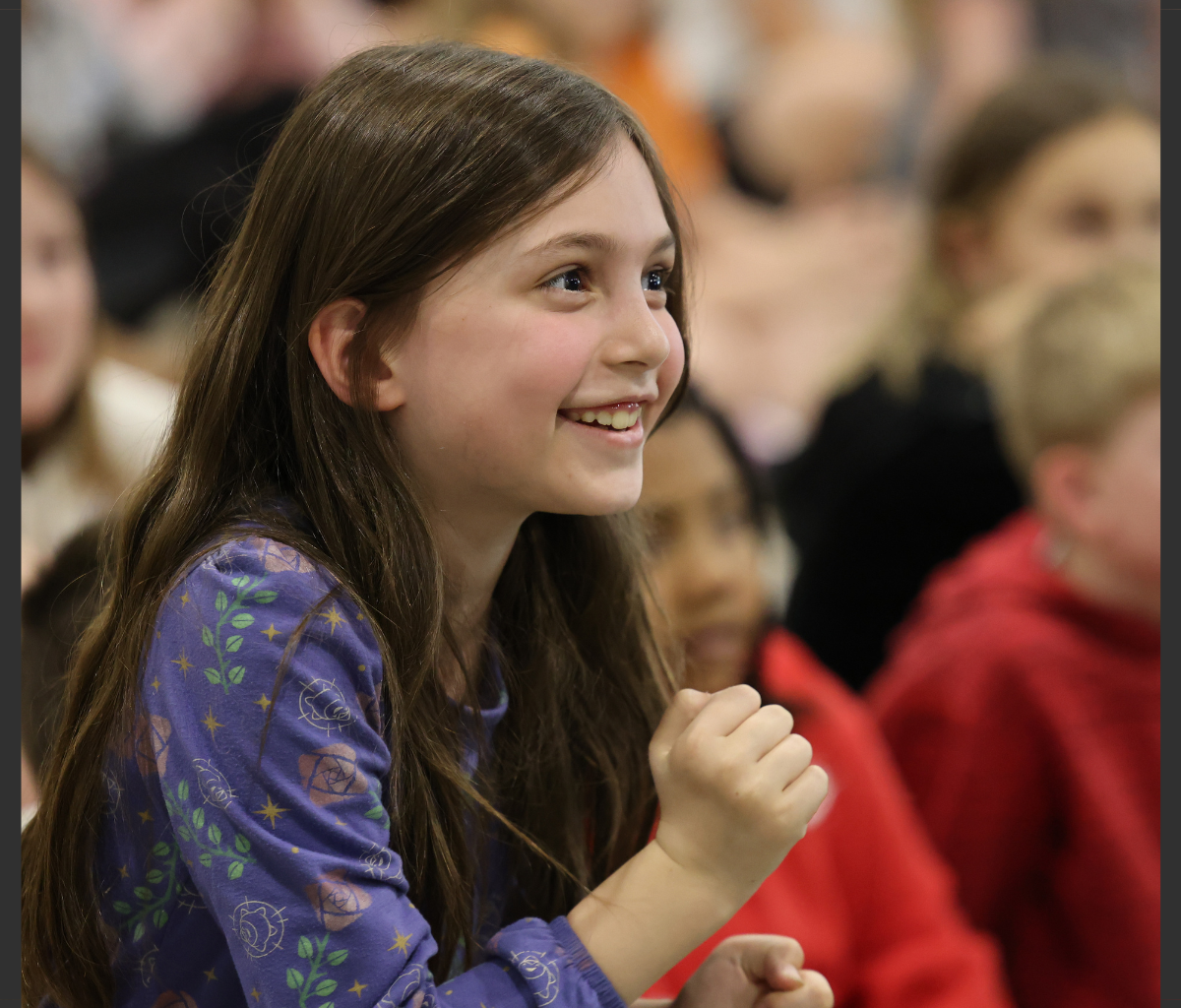 Sprinkle, don't pour: author visit inspires K-5 writers