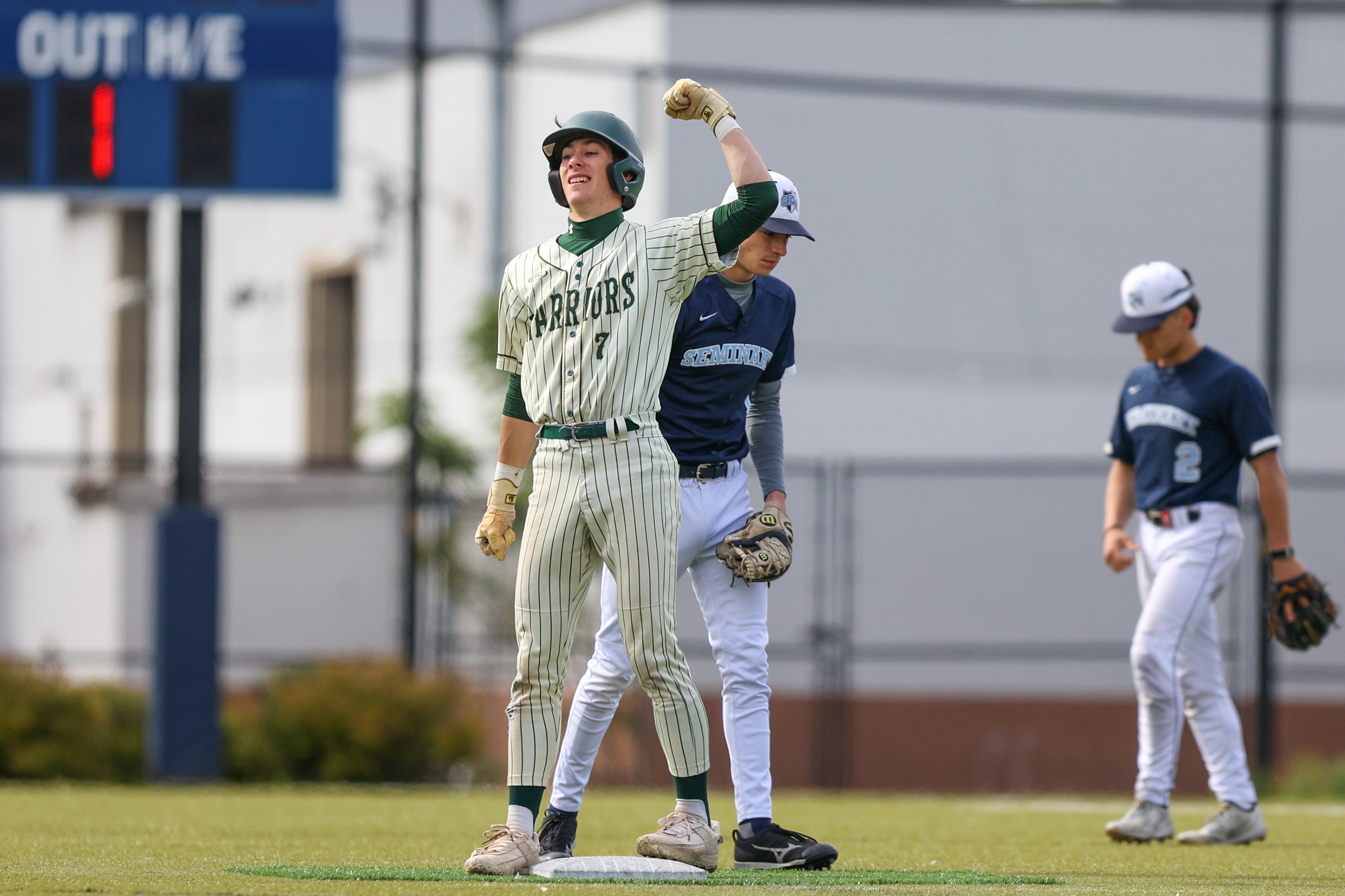 Wyoming Area’s Jake Snyder (7) celebrates after hitting a double...