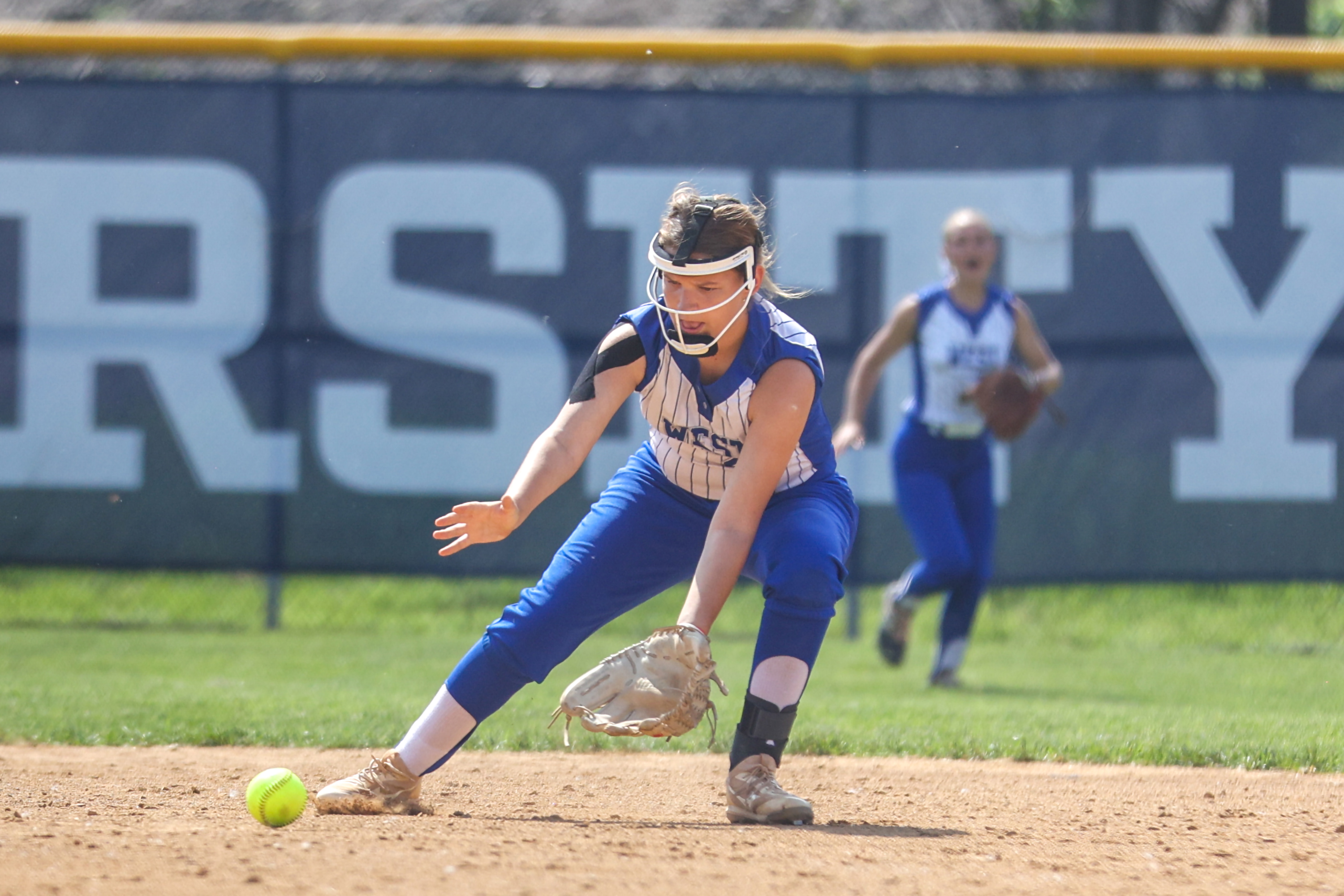West Scranton’s Isabella Lutz fields a ground ball in the...