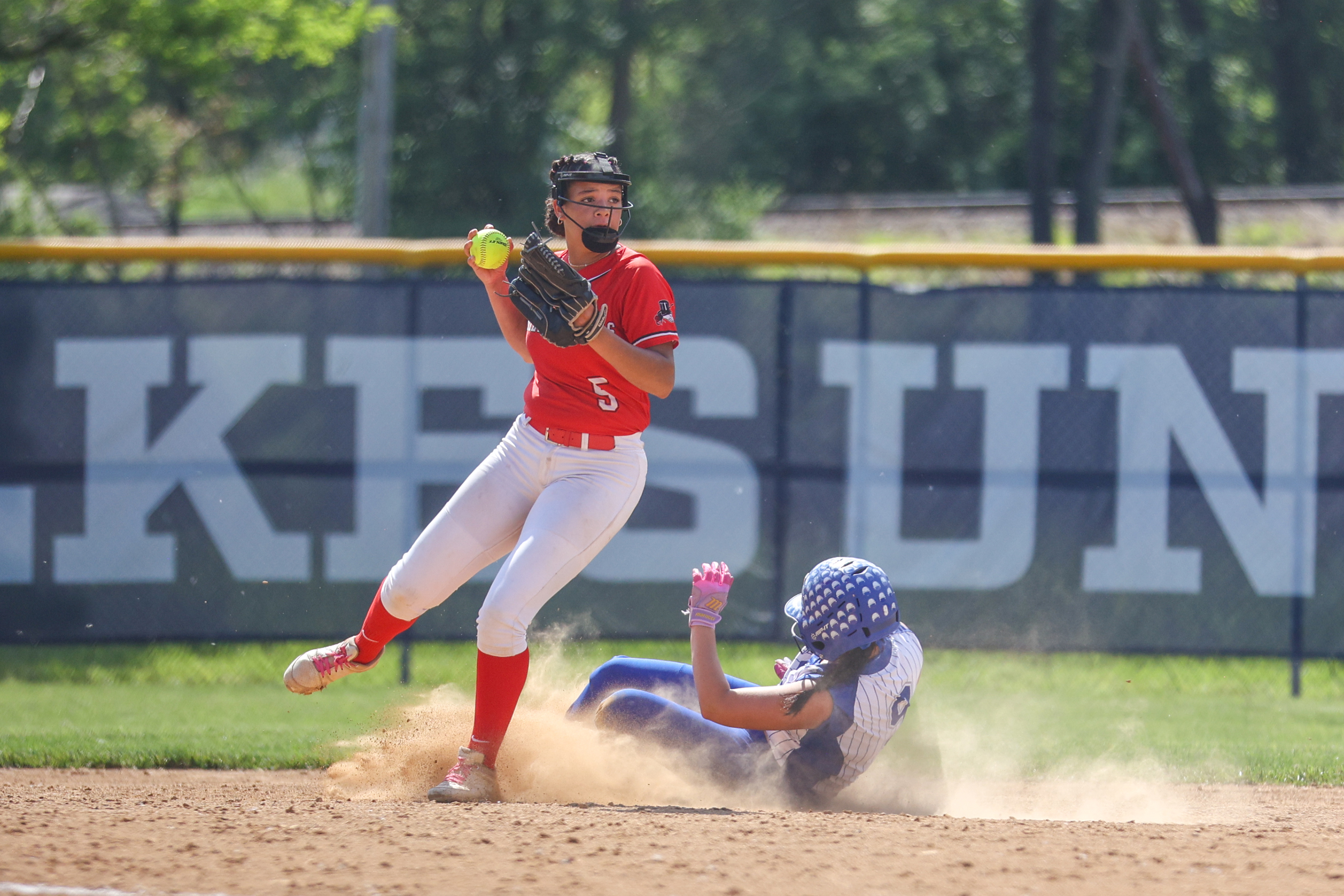 Williamsport’s Zaelana Minor (5) looks to make a double play...