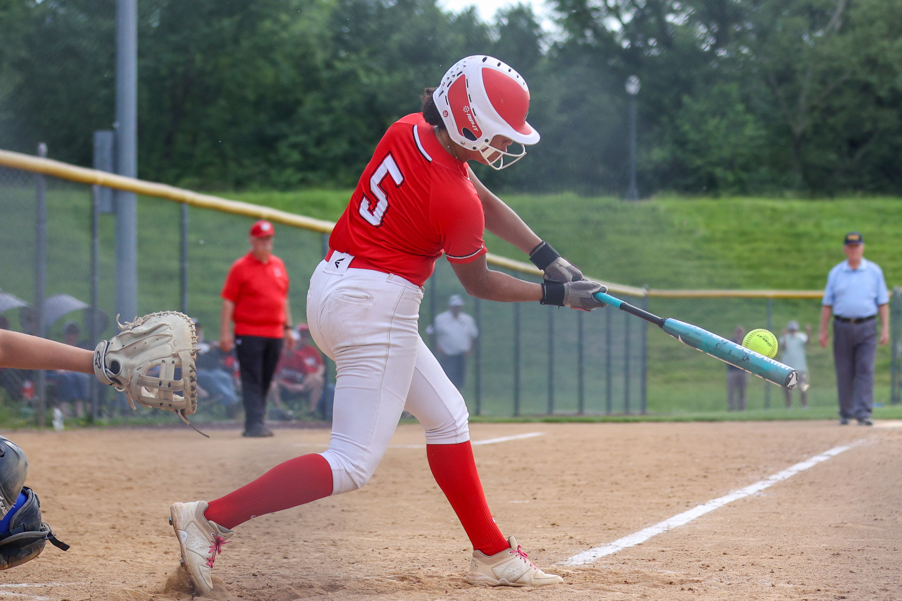 Williamsport’s Zaelana Minor (5) connects with a swing in the...