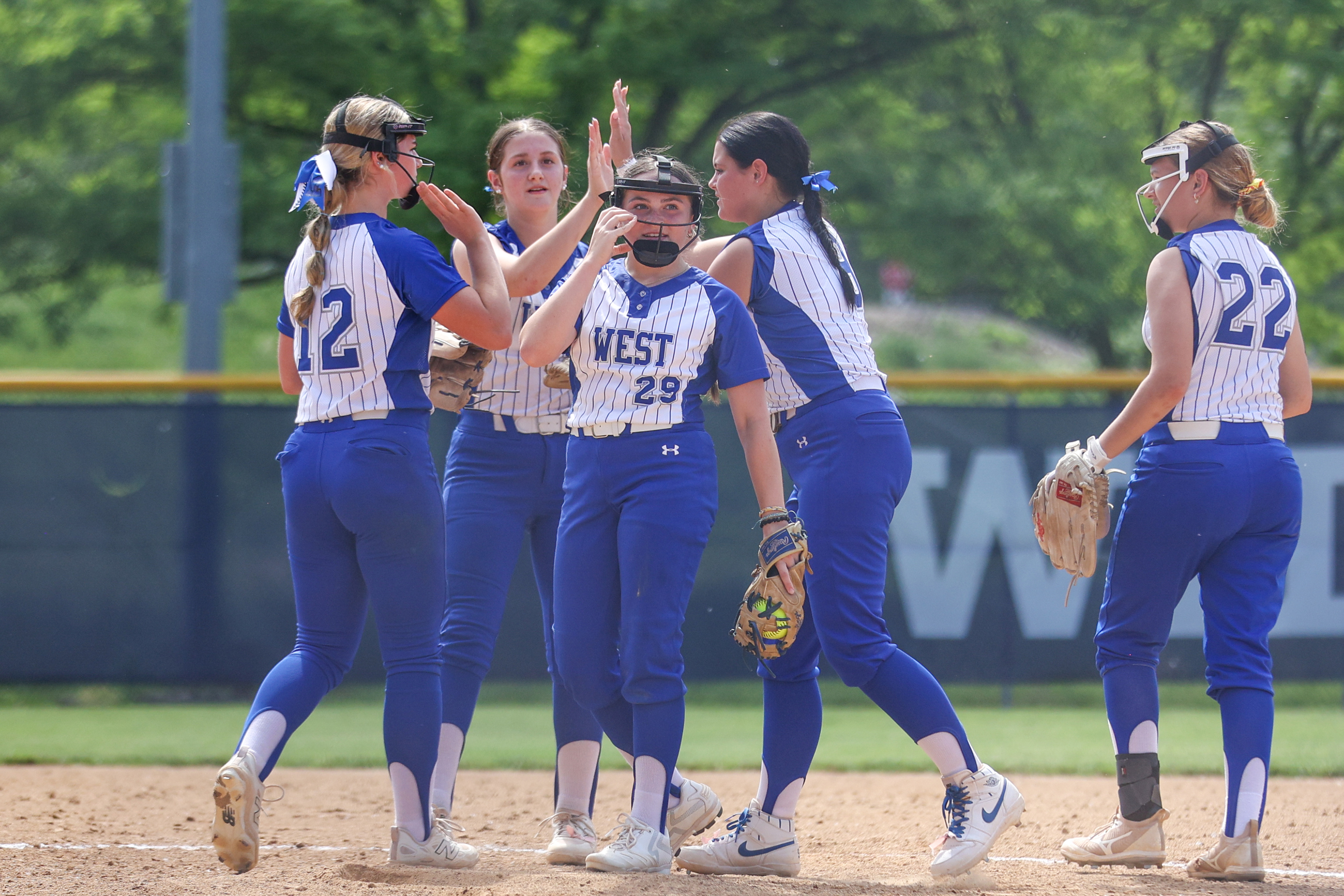 West Scranton celebrates as Kaleiah Connor gets a strikeout in...
