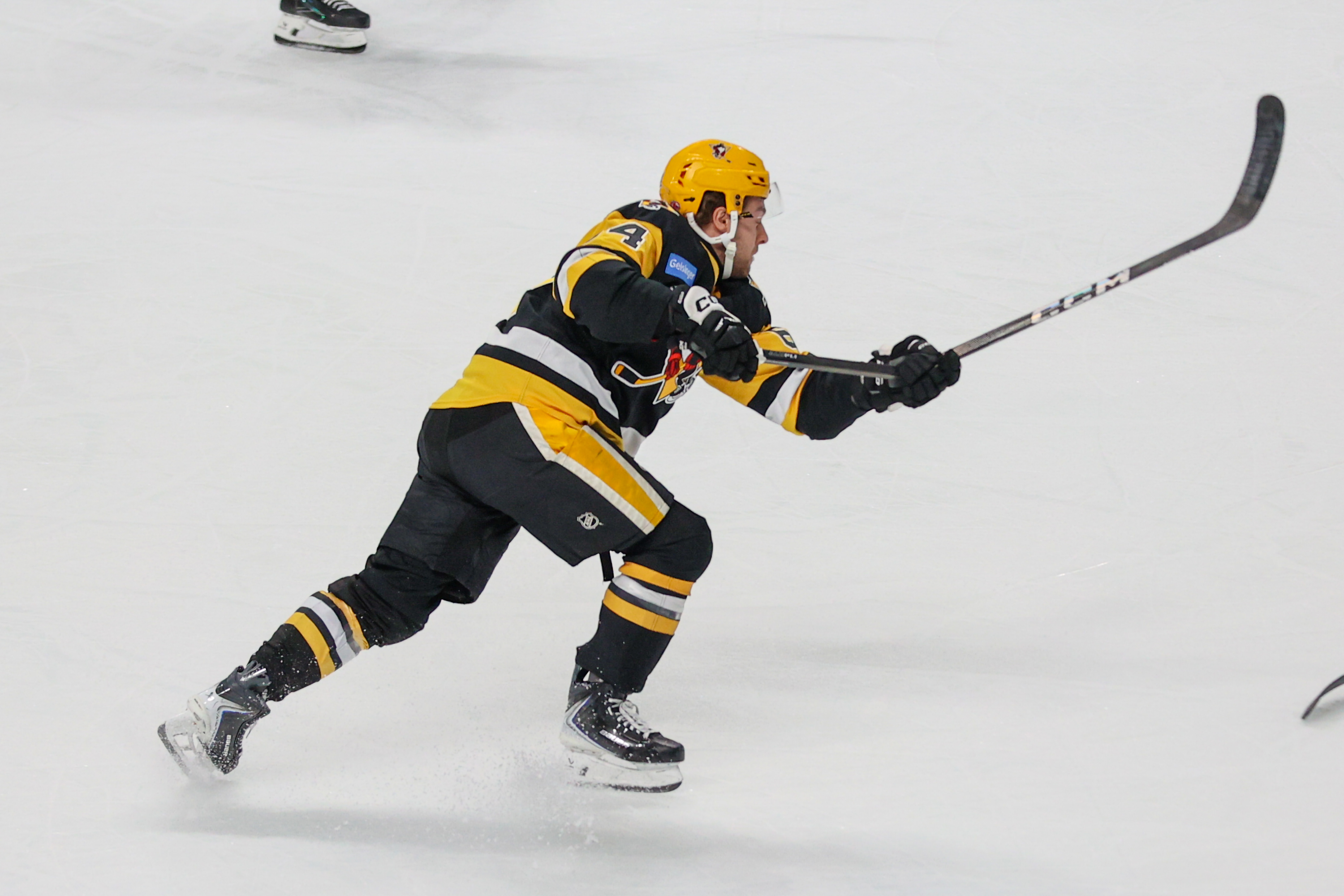 Wilkes-Barre/Scranton’s Gabe Klassen breaks his stick while taking a shot...