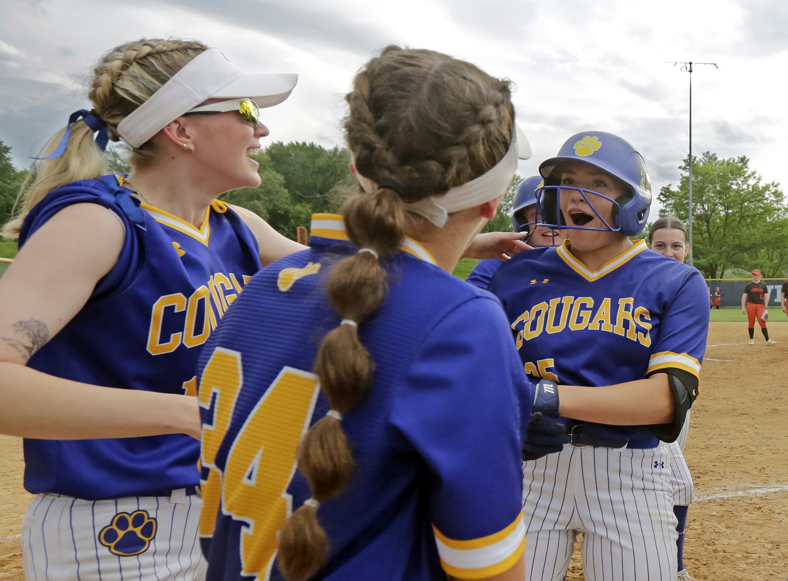 Valley View’s Abbi Call, right, celebrates at home plate after...