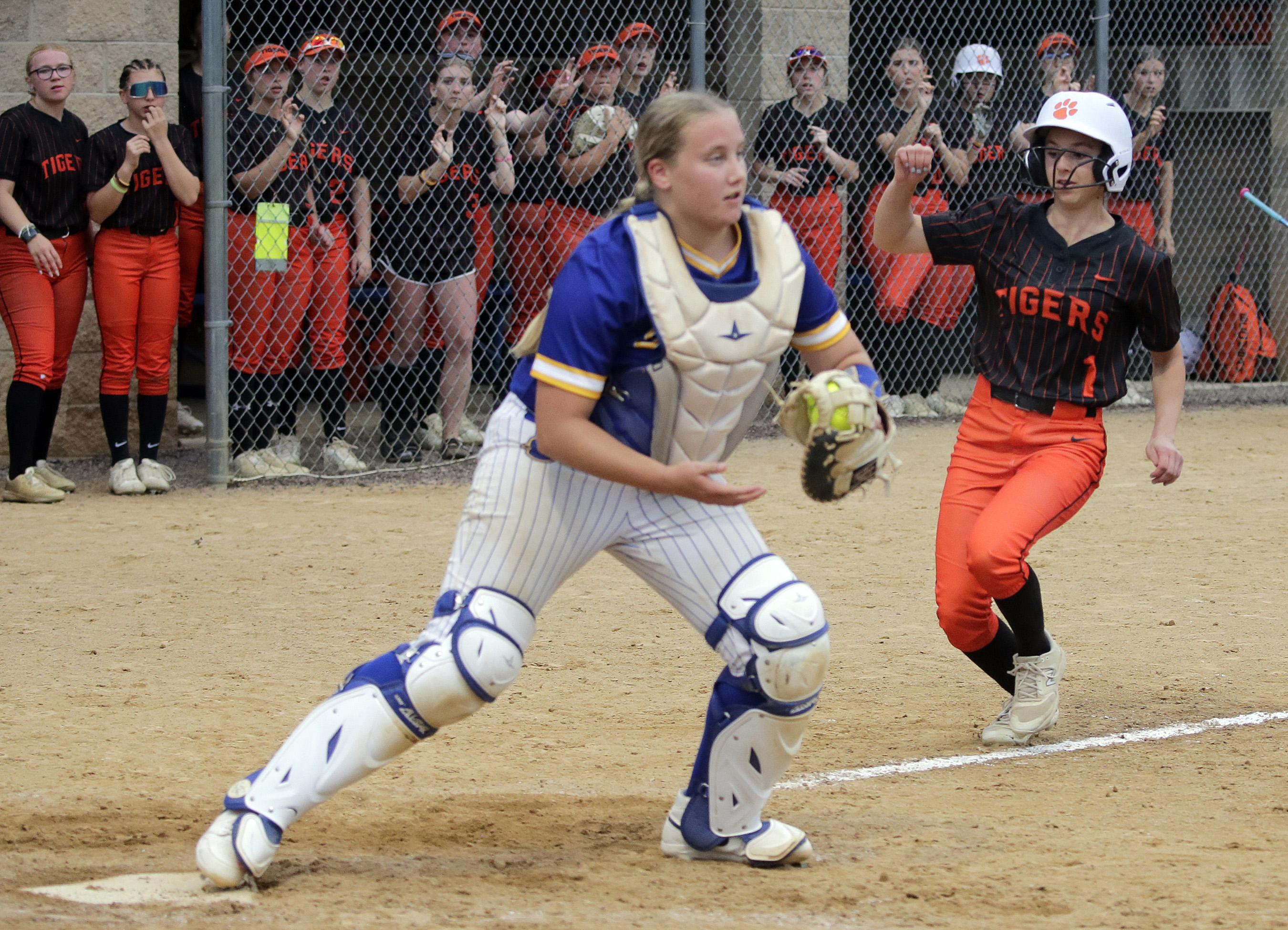Tunkhannock’s Jordyn Burnaford, right, is forced out at home plate...
