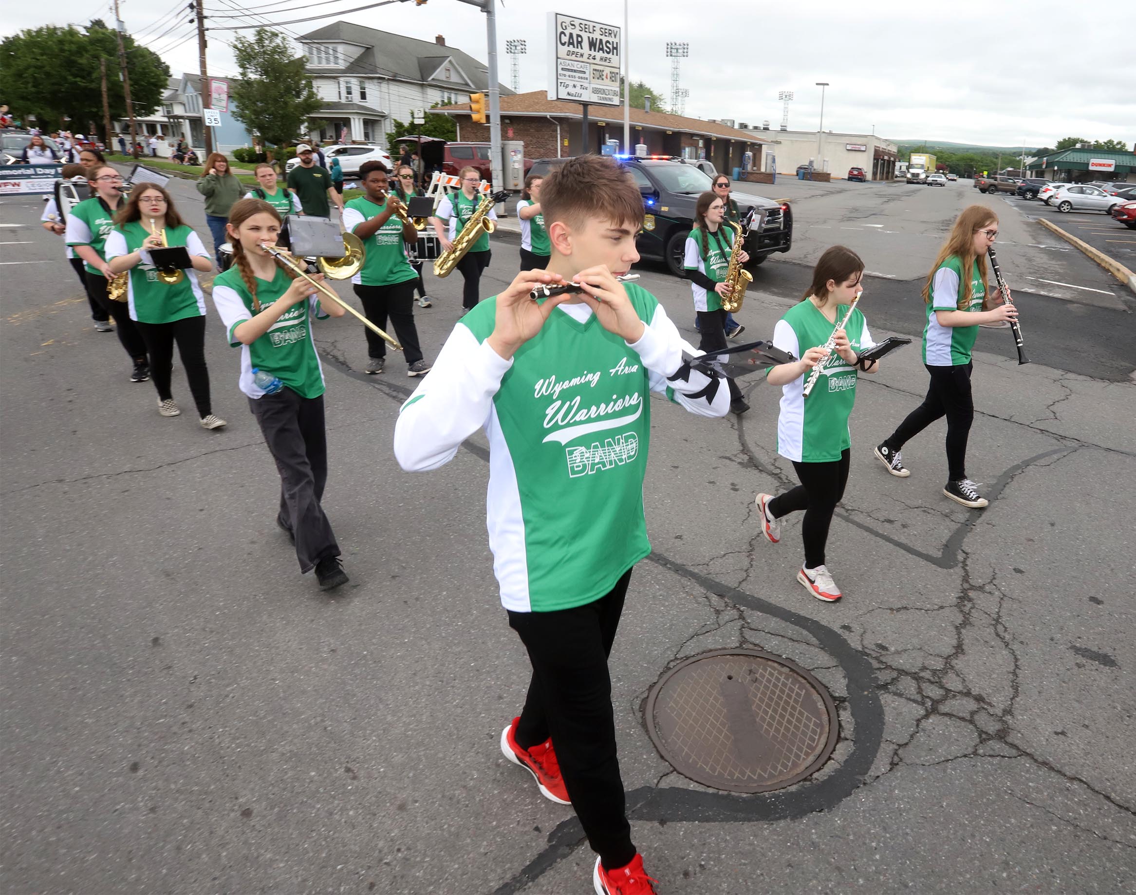 The Wyoming Area marching band makes its way along Wyoming...