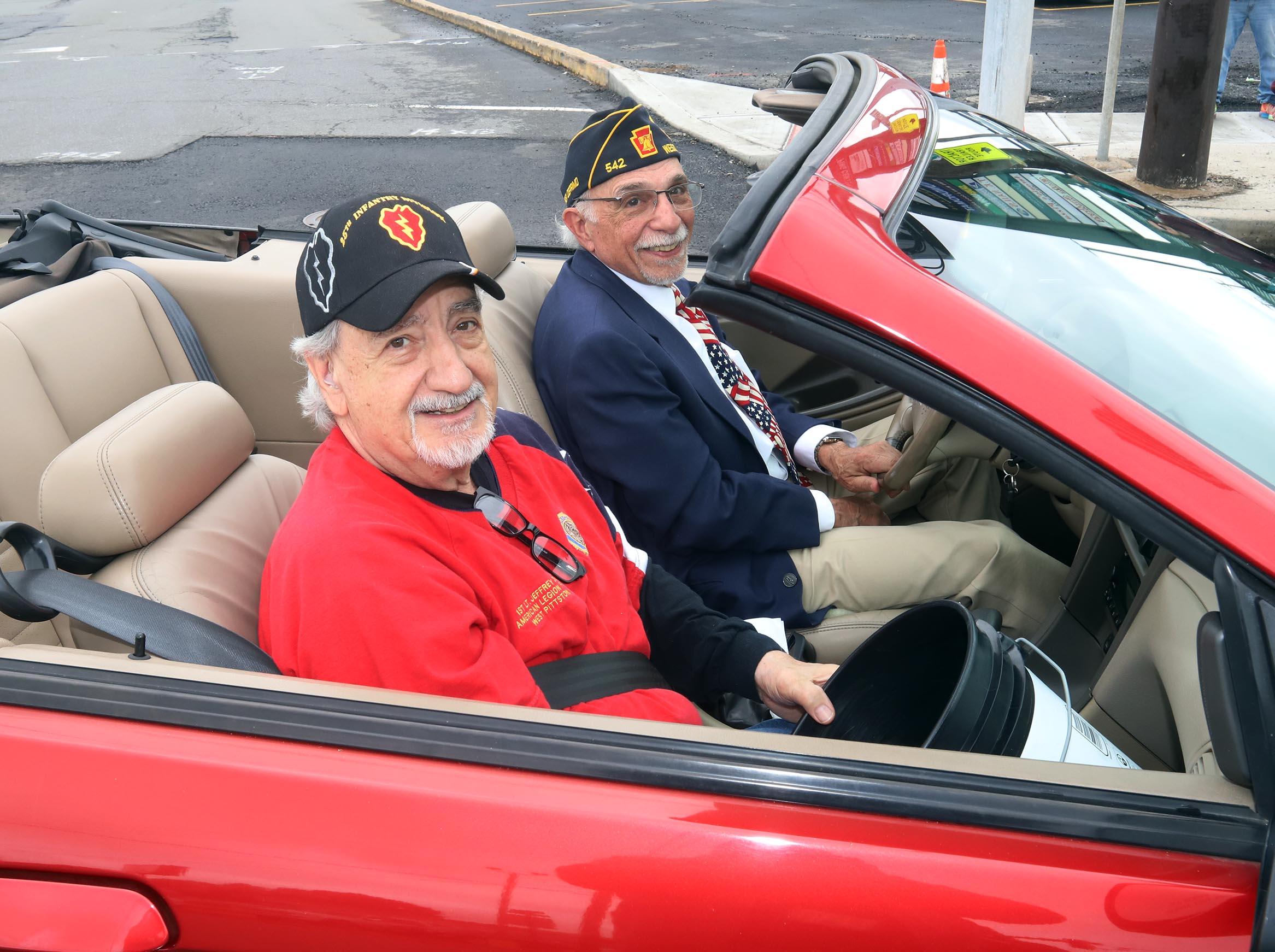 Veterans Greg Shiner and Chip Bell make their way along...