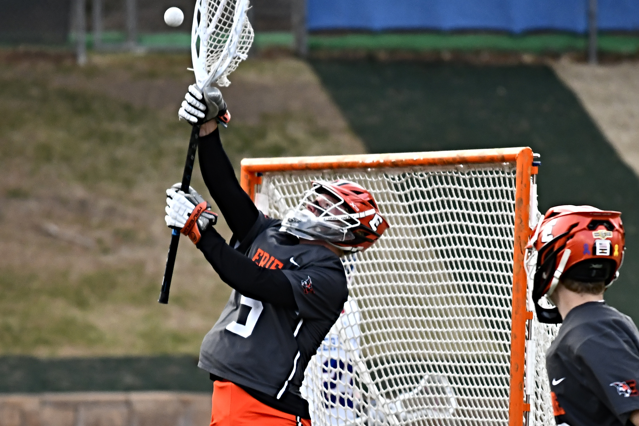 Erie's Luke Foley makes a save against Cherry Creek during...