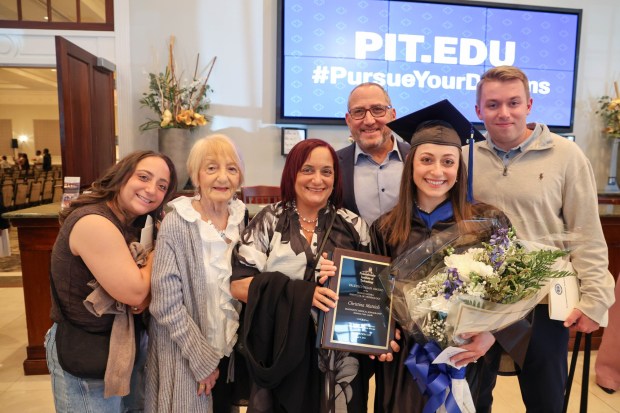 The Mattioli family of Ridley Township celebrates a milestone moment on graduation day at the Drexelbrook in Upper Darby. (COURTESY OF JESS DIXON))