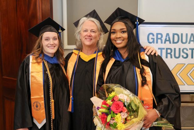 Technology Nursing Professor Geralyn Swindell celebrates graduation day with Christina Miller of Brookhaven, left, and Jamiyah Fletcher of Upper Darby. (COURTESY OF JESS DIXON)