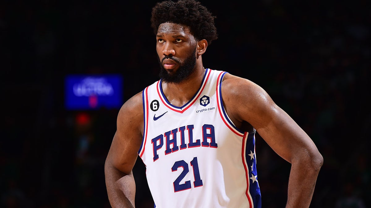 Joel Embiid of the Philadelphia 76ers looking on during NBA playoff game at TD Garden in Boston