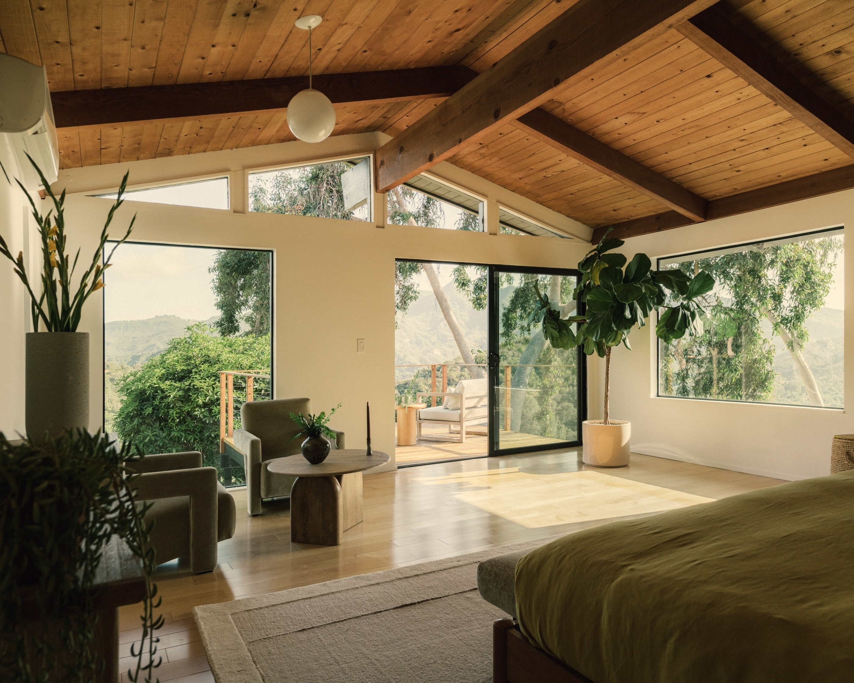 The primary bedroom opens to a private balcony. (Photo by...