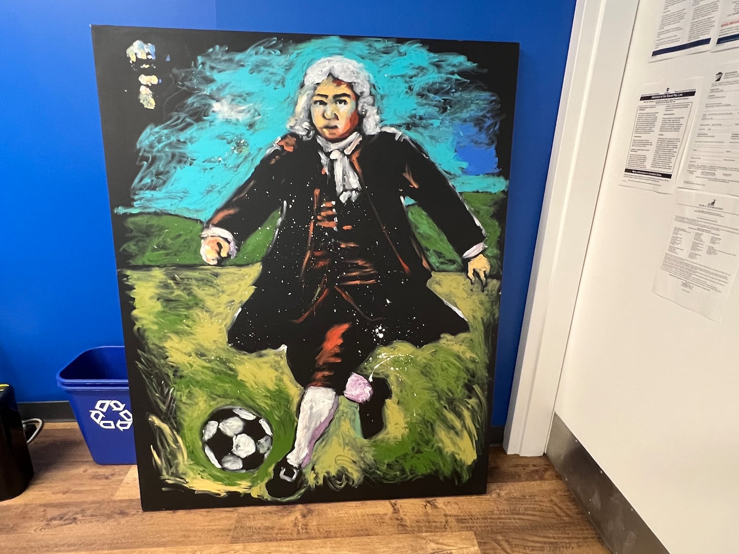 A painting of Ben Franklin kicking a soccer ball decorated the offices of Philadelphia Soccer 2026, the organizing committee for the city's World Cup games.