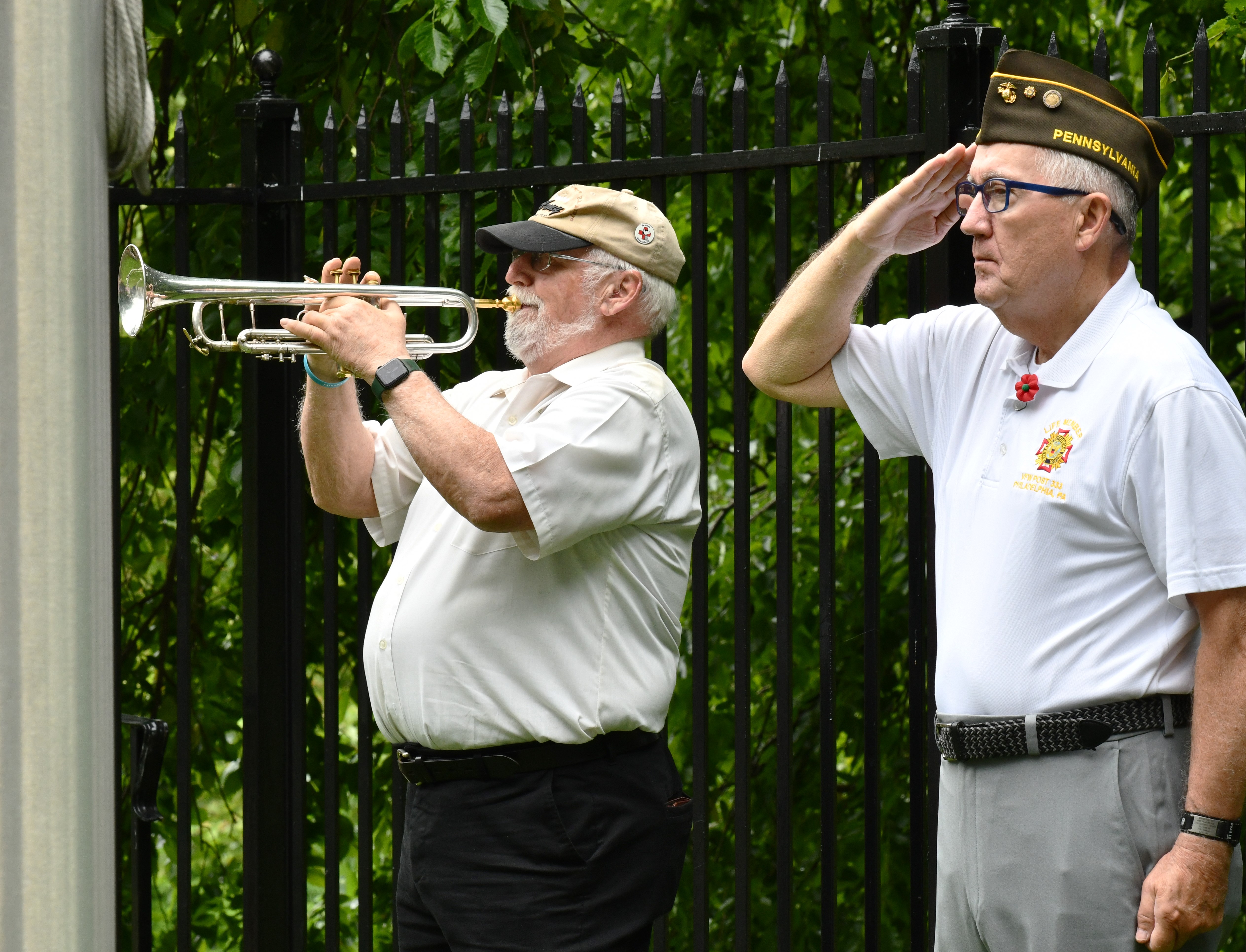 Talented bugler Mike Williams, next to Mike McFall, performs regularly...