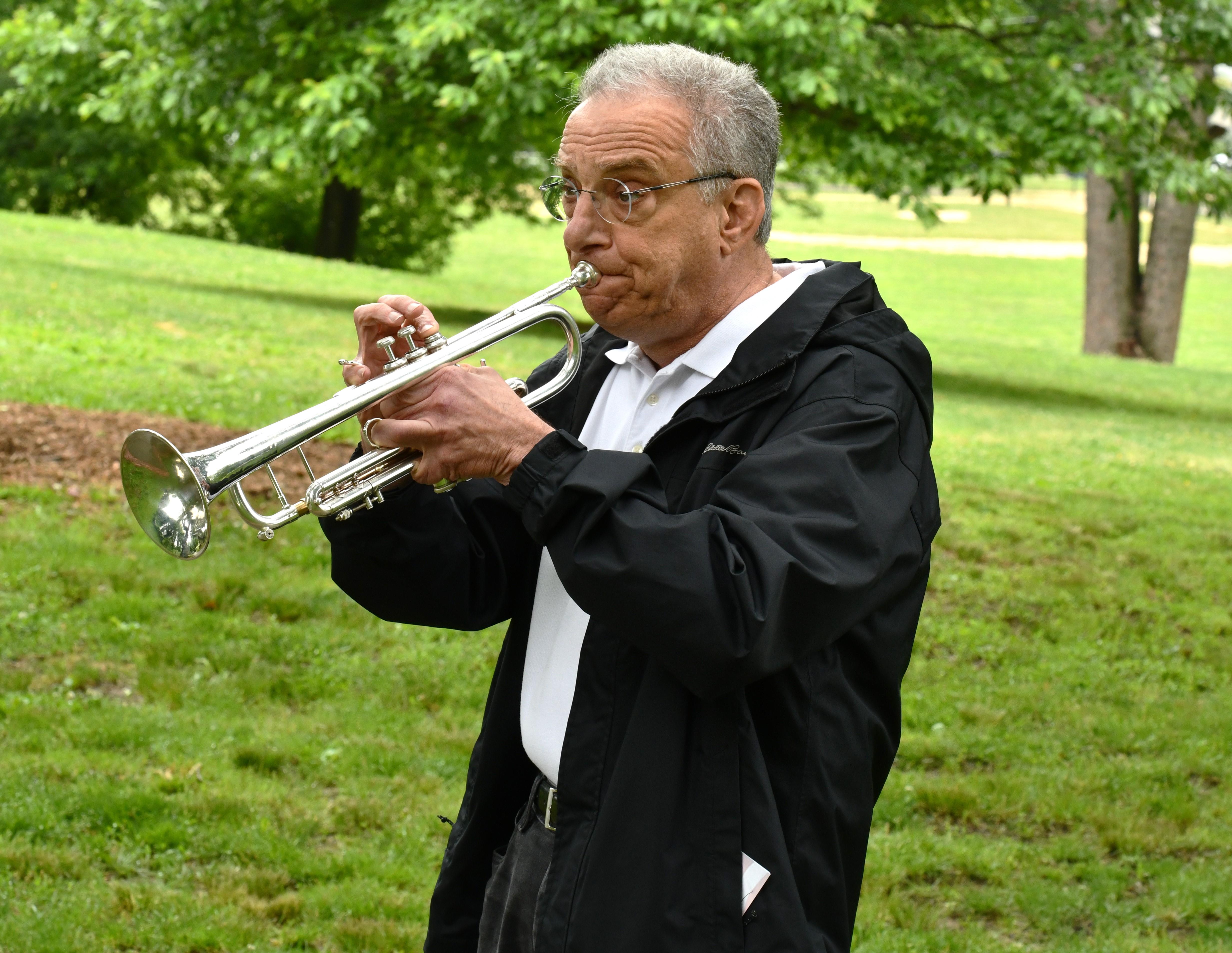 Bugler Mike Bromberg might play ‘Taps’ off in the distance,...