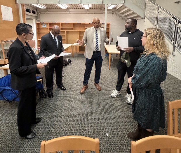 Volunteers are prepped for student interviews by program founder Eric Ervin prior to their arrival. (Photo courtesy of John Katrina)
