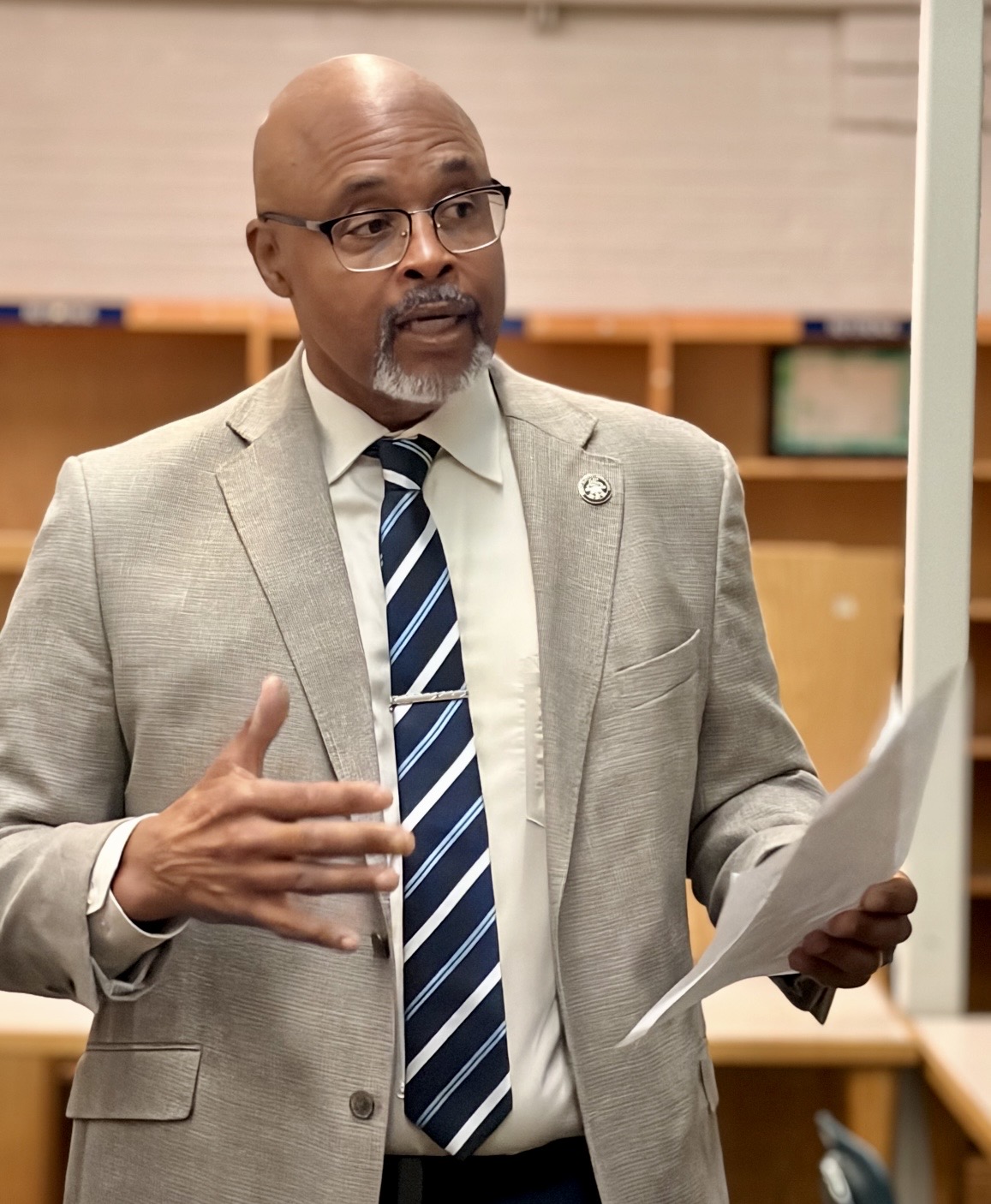 Retired Lt. Eric Ervin demonstrates the goal for the student’s...