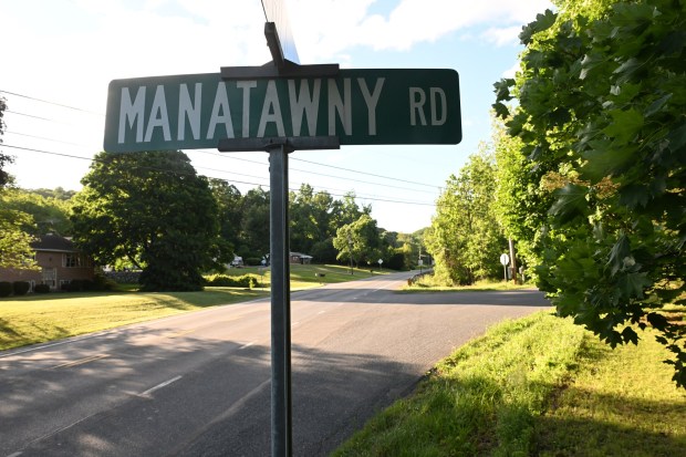 A Central Berks Regional Police officer died Friday evening in a crash in Earl Township while responding to a call. Officer Kristen Yeager was killed when her cruiser left Rte. 73 at Manatawny Road and crashed into a tree. (BILL UHRICH/READING EAGLE)
