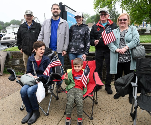 Watching and participating in the 66th annual Mohnton Memorial Day Parade on Monday, May 25, 2026, has become a tradition for the Lewis and Swartz families. Standing from left, are Dennis Swartz; Kyle and Heather Lewis; Keith and Cathy Lewis; and seated are Annbeth Swartz and Owen Lewis, 5. (BILL UHRICH/READING EAGLE)