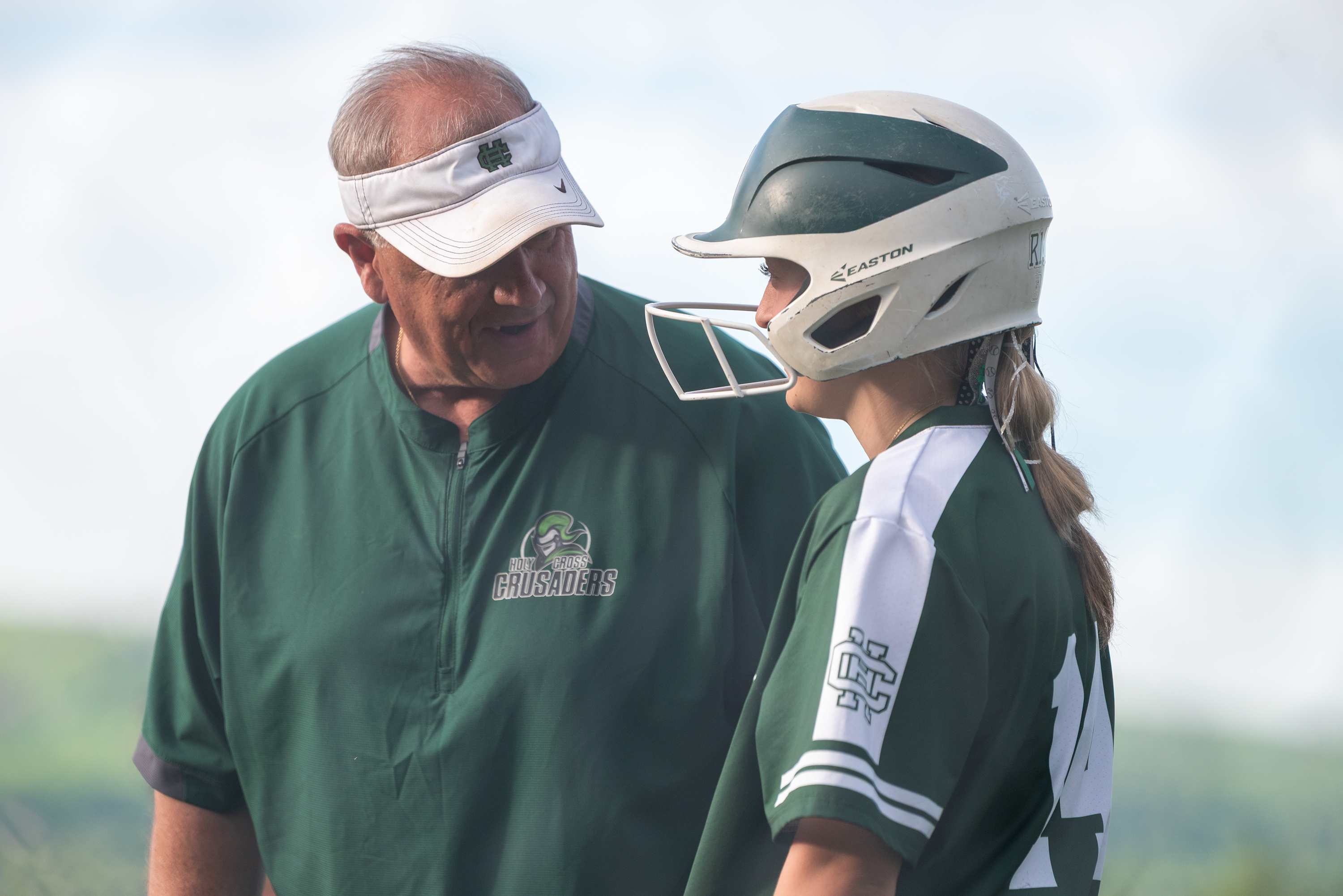 Holy Cross head coach Joe Ross talks to Lila Kolcharno...