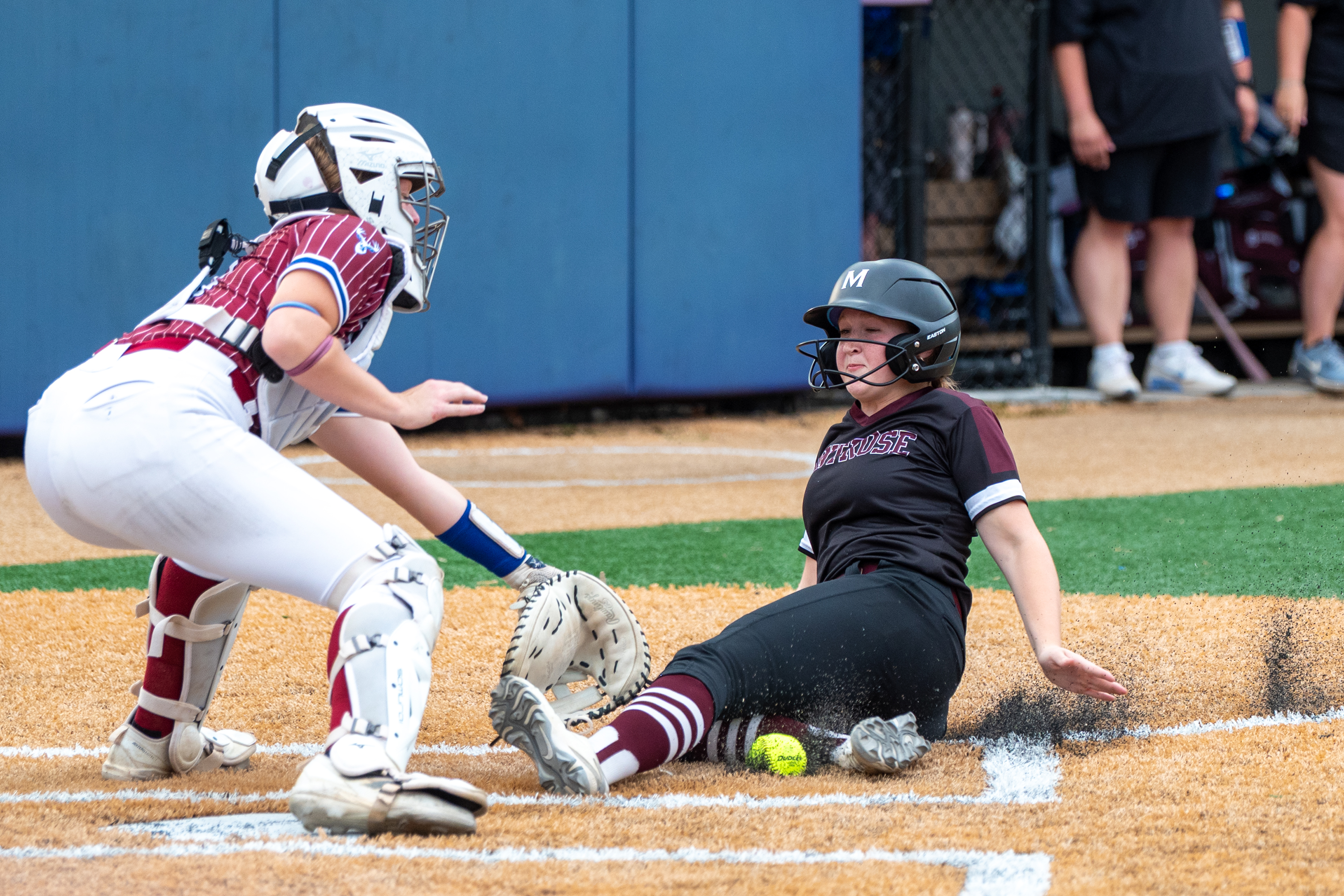 Dunmore’s Jackie Brown tries to get Montrose’s Rylee Traver out...