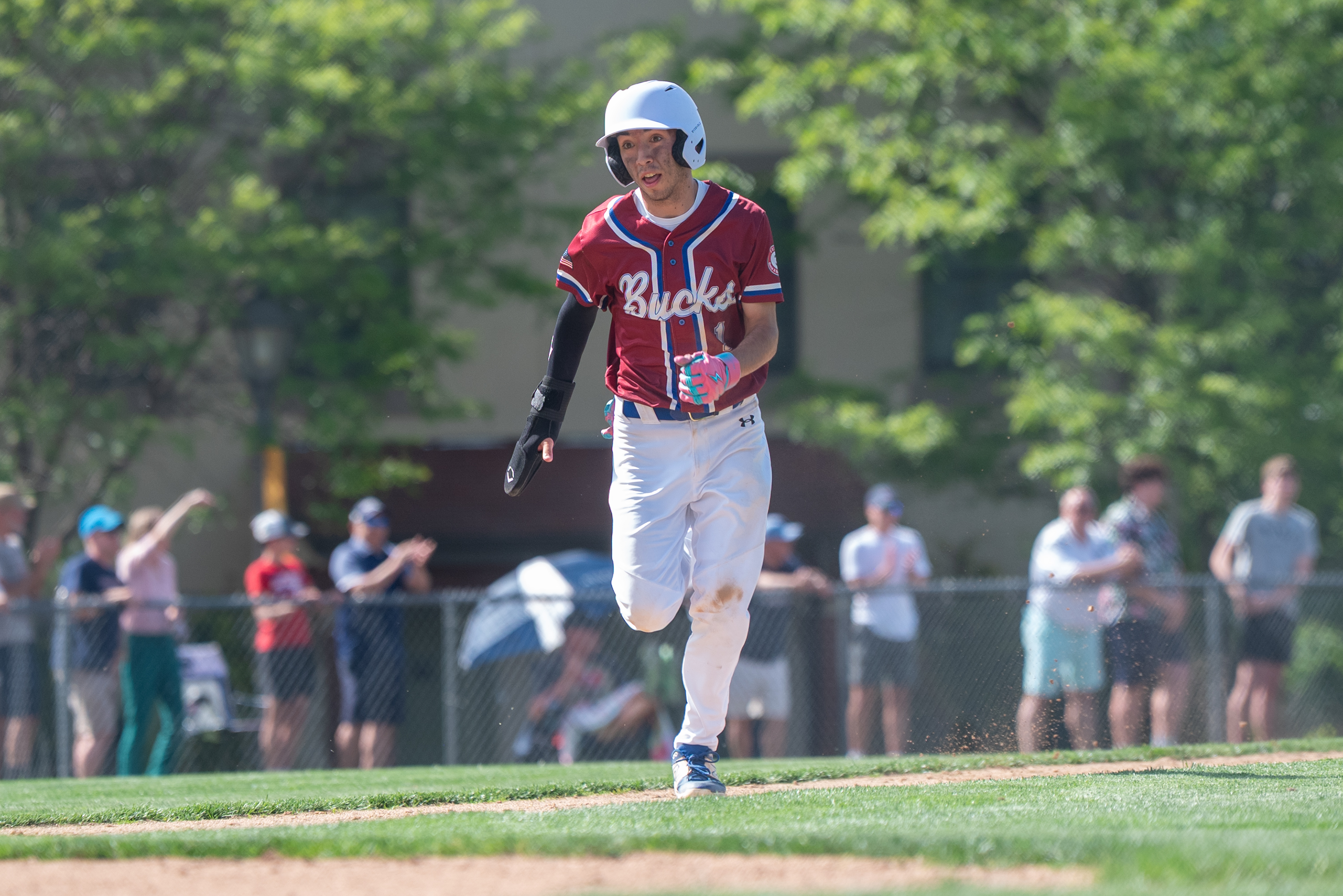 Dunmore’s Jaedyn Kura runs toward home during the District 2...