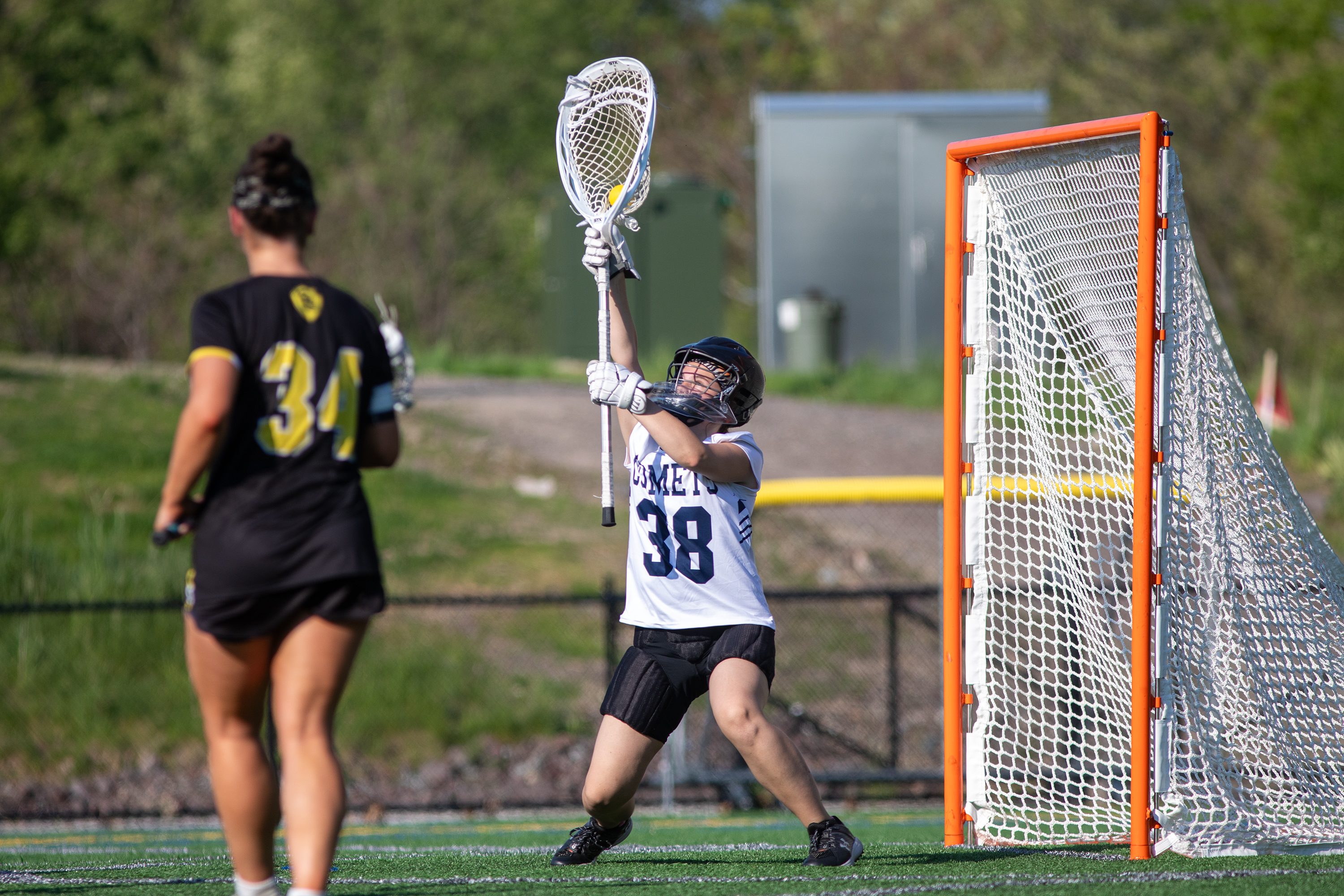 Abington Heights’ Addison Waters defends the goal during the lacrosse...
