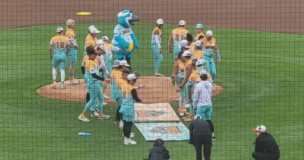 The Loco Coconuts make their way onto the field at the Banana Ball game on May 22, 2026 at PNC Field. (GERI GIBBONS/STAFF PHOTO)