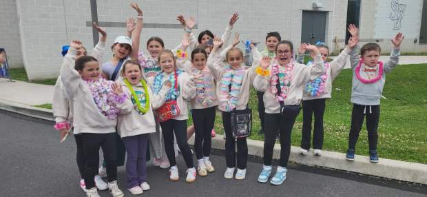 Margo Wilcha and 14 of her friends took a party bus to the Banana Ball game to celebrate her ninth birthday on Friday, May 22, 2026. (GERI GIBBONS/STAFF PHOTO)