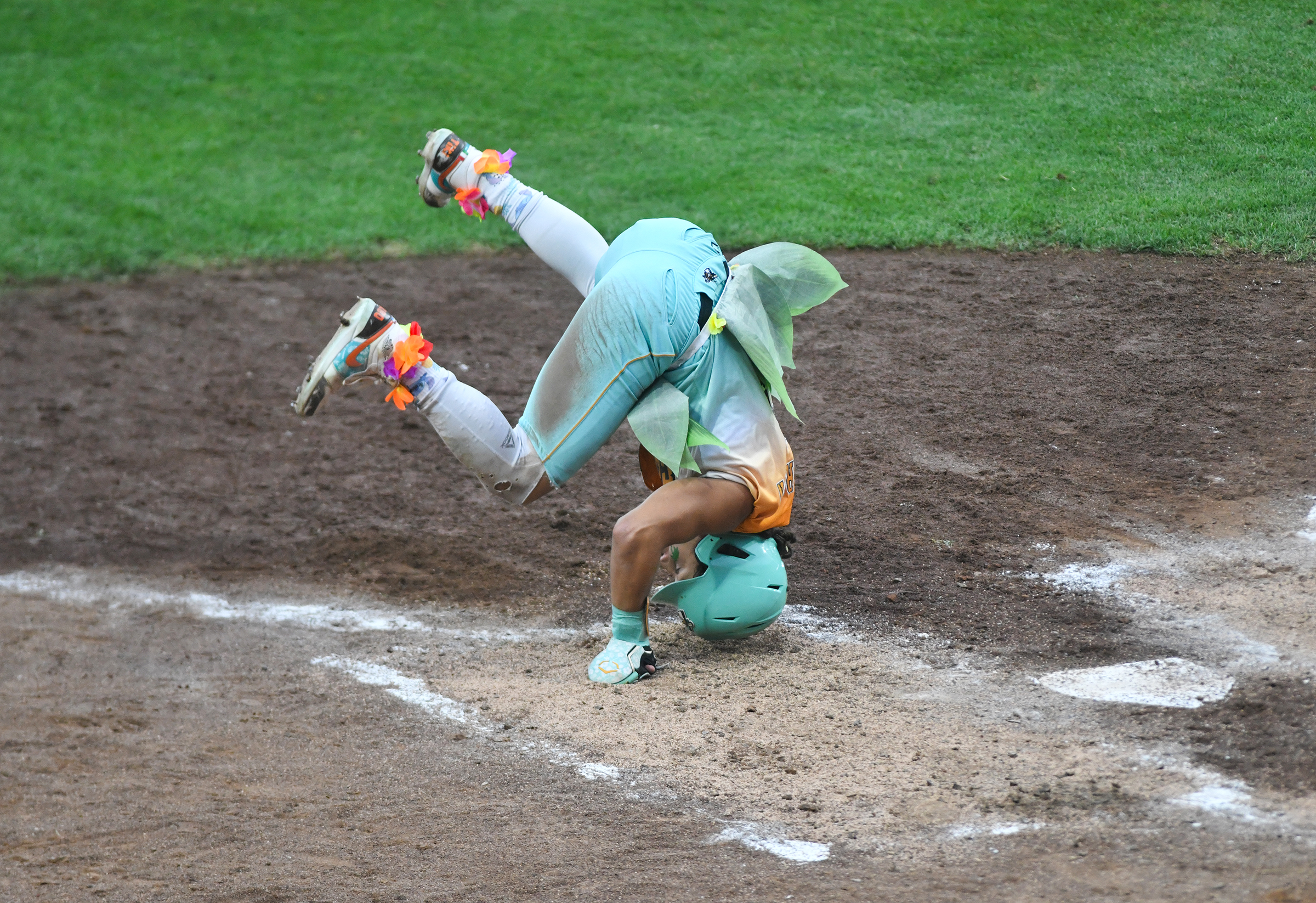 The Loco Beach Coconuts’ Armani Henderson does a reverse somersault...