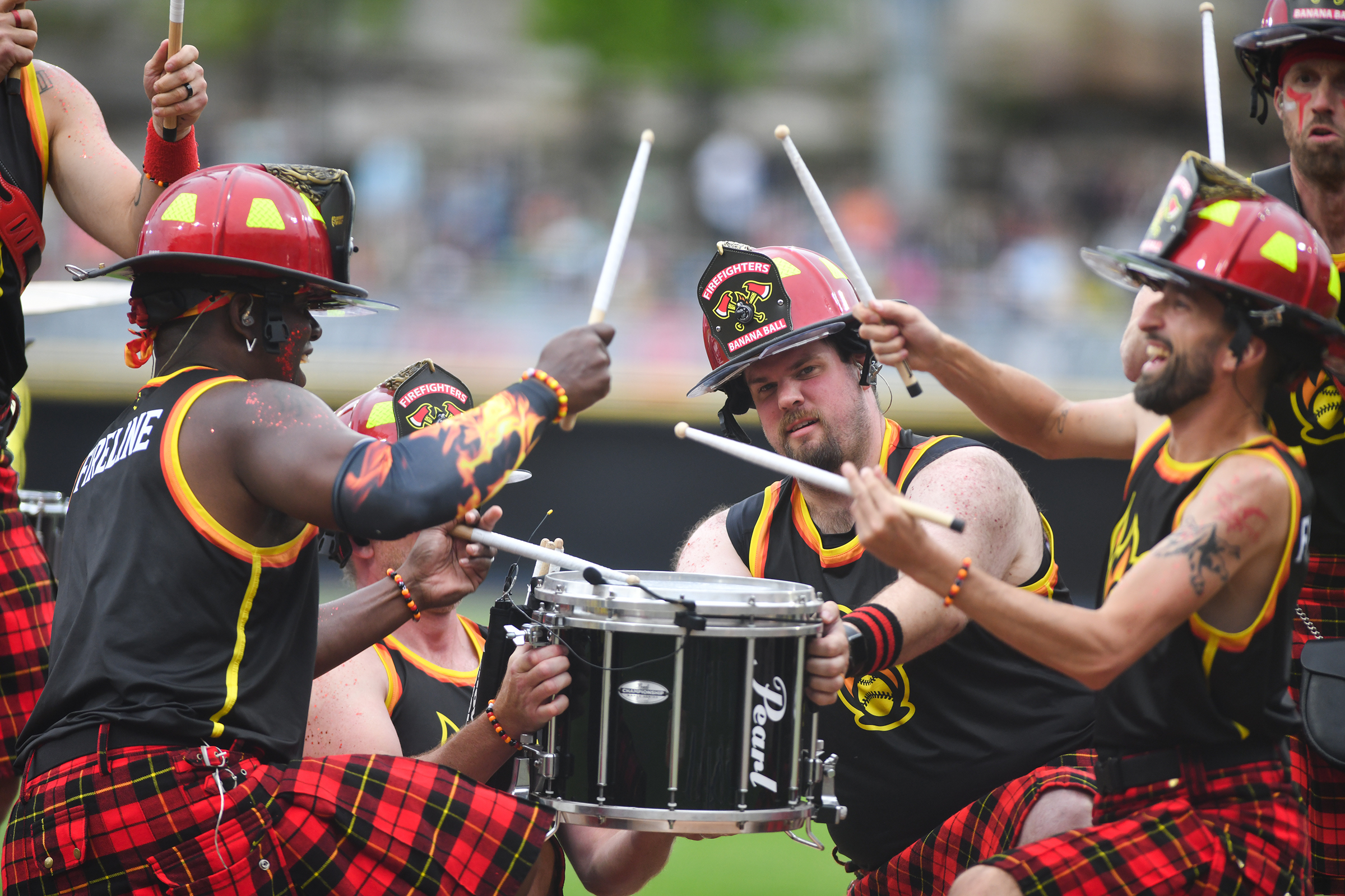 The Firefighters’ drum line ‘The Fireline’ perform before the game...