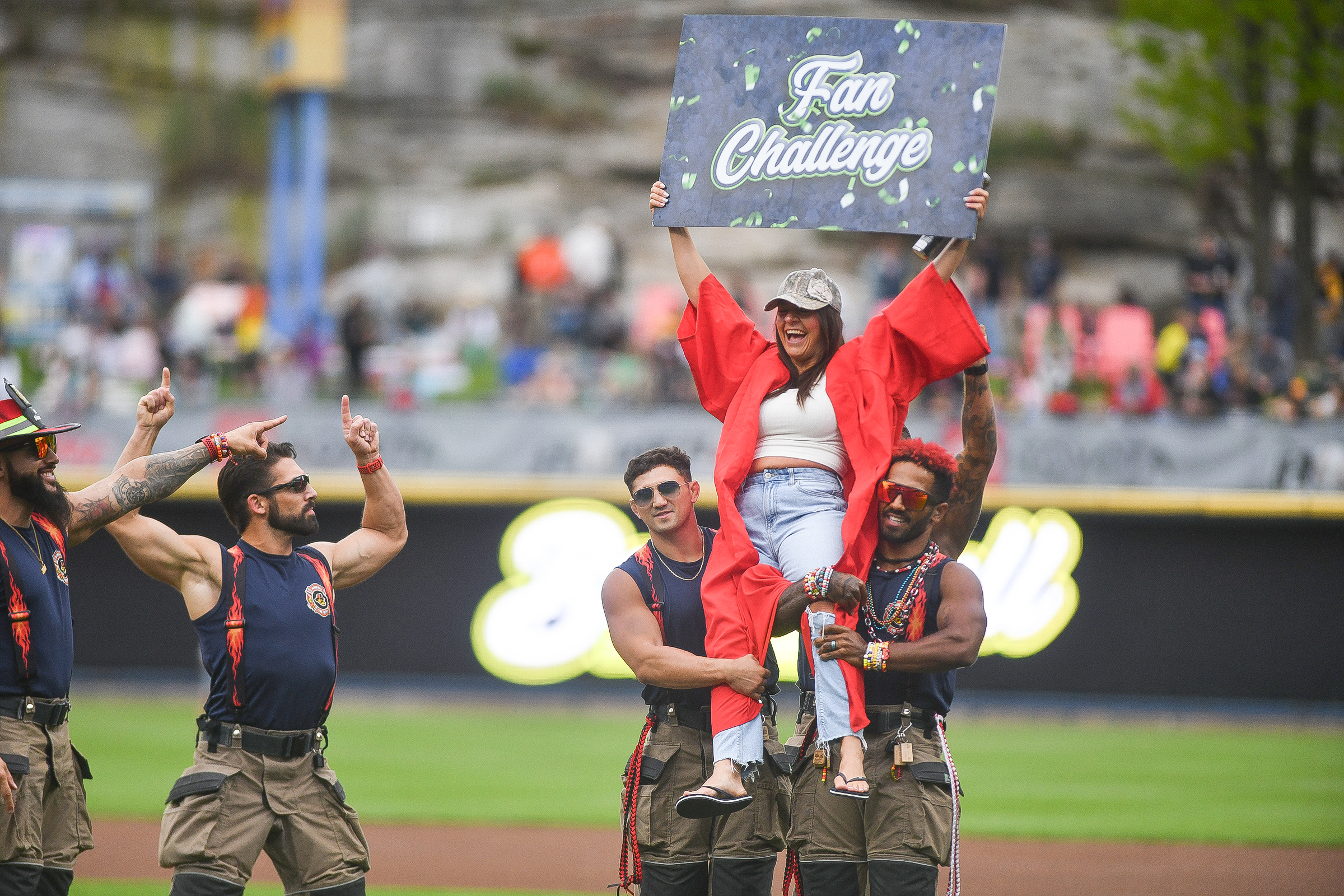 The Firefighters players hold up a fan during the ‘Fan...