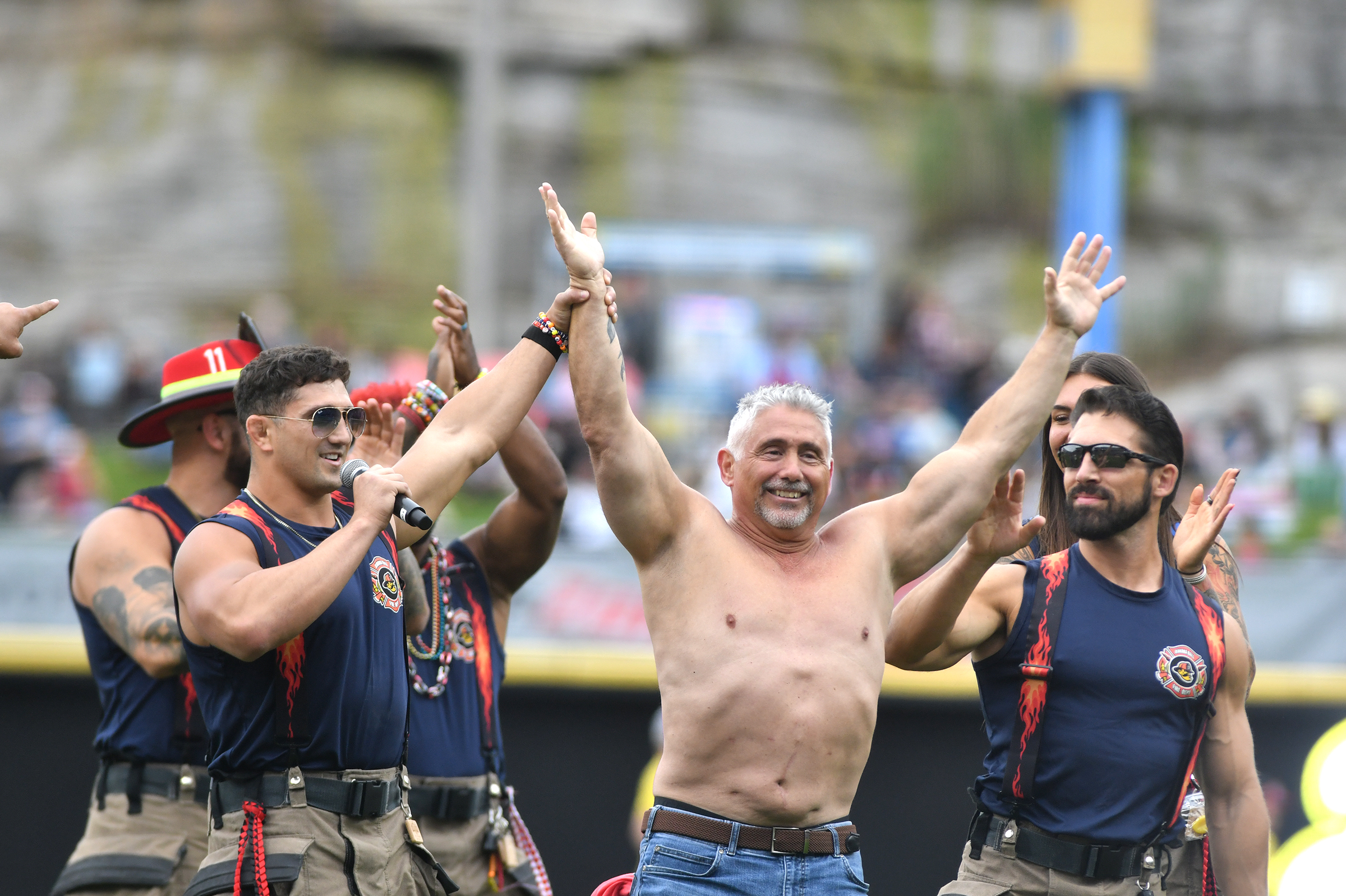 A man from the crowd wins a competition held by...