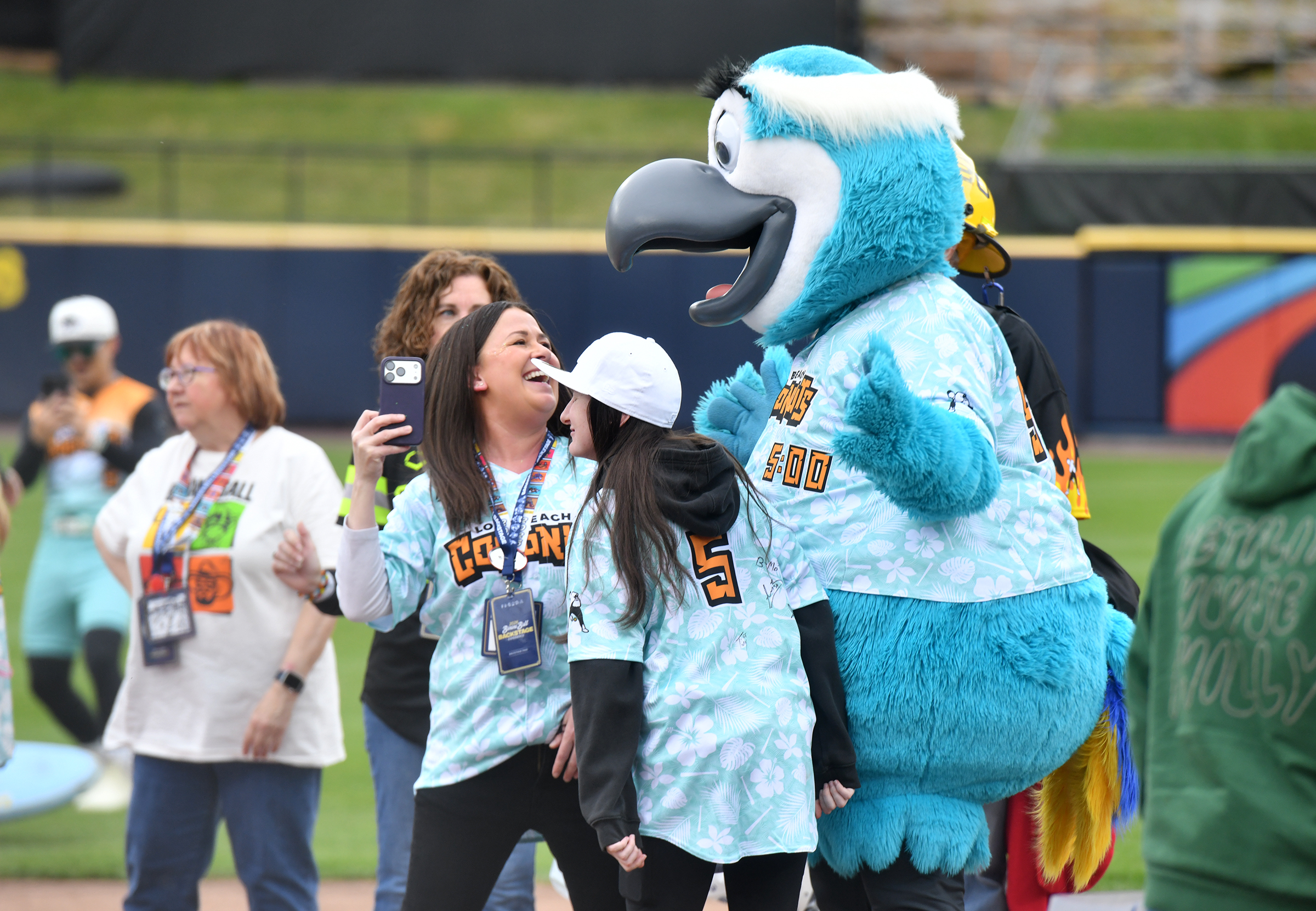 The Loco Beach Coconuts mascot Peter Colada interacts with fans...